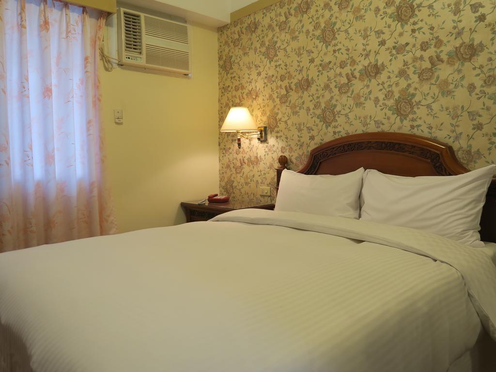 Champagne Hotel Jiaoxi Camera foto